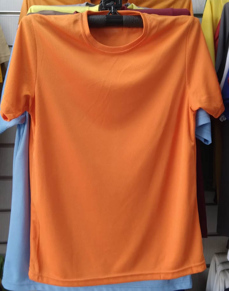 Dry Fit Collection Orange Color Polyester Mesh by Orient Uniforms for customers in Dubai, Abu Dhabi, Sharjah, Ajman and across the UAE